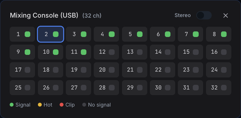 The input picker showing all 32 channels arriving from a digital mixing console, with green dots marking the channels that currently have signal